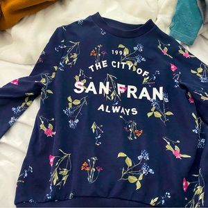 it’s a blue flowery jumper